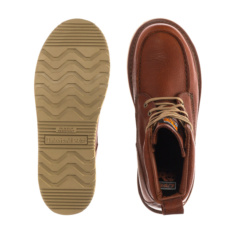 Rust brown wedge boot outsoles and heel view, showing lace-up opening