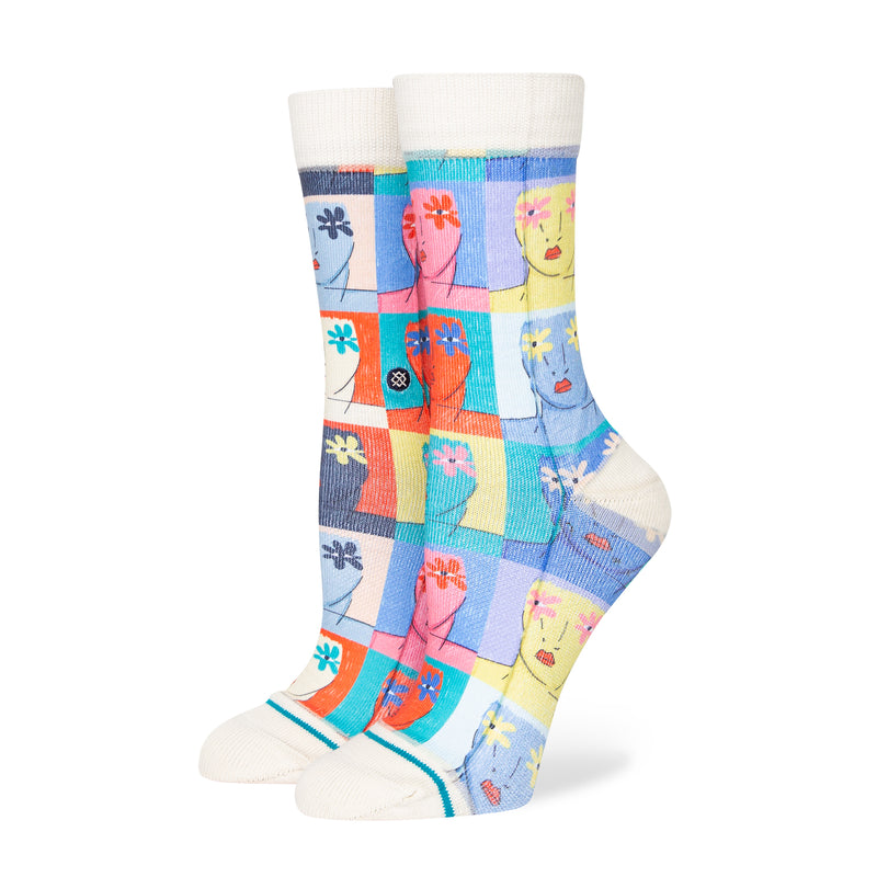 Womens crew socks with vintage white base and multicolor face-and-flower pattern