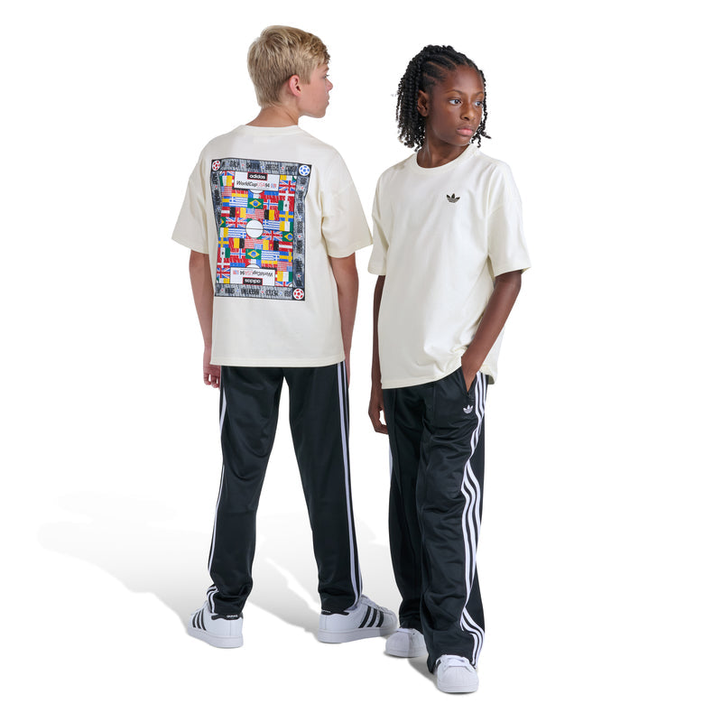Off-white youth crewneck tee; small chest logo on front, colorful back graphic on other