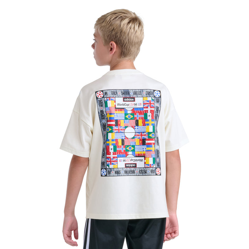 Off-white youth crewneck tee with large colorful World Cup 94-style back print