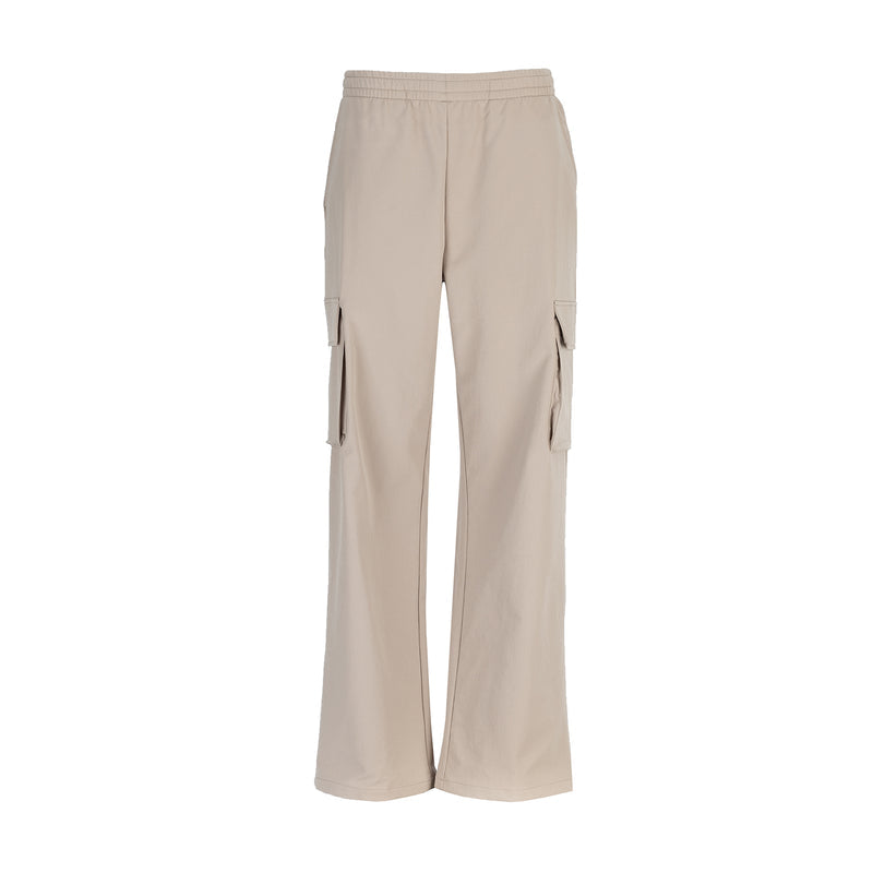 Women’s woven cargo pants, light mocha with cargo flap pockets and drawstring waist.