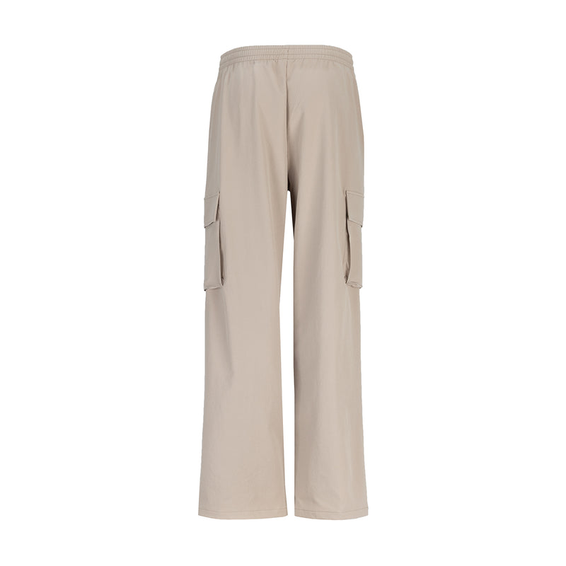 Light mocha woven cargo pants, back view with cargo flap pockets and wide legs.