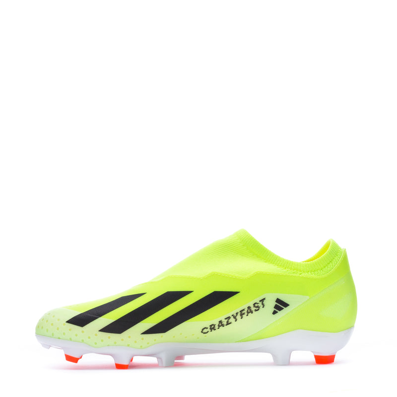Men's soccer cleats side view, neon yellow-green with black logo and red studs