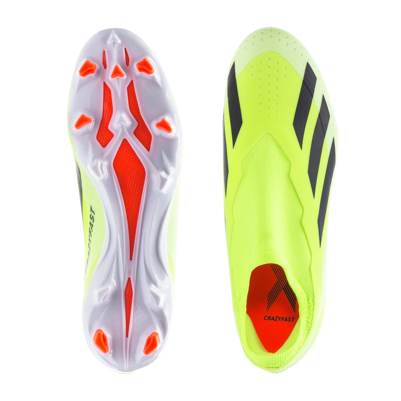 Pair of soccer cleats soles and uppers, neon yellow-green with red studs and black accents