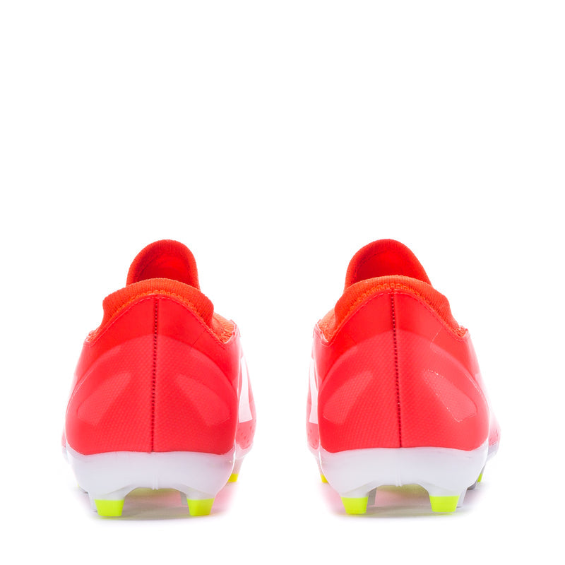 Men's red soccer cleats back view with white stripes and green FG studs