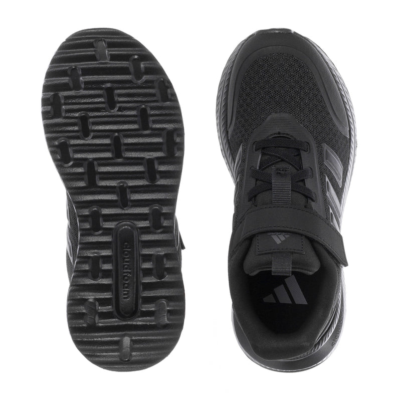 Kids sneaker outsole tread and black side profile with velcro strap