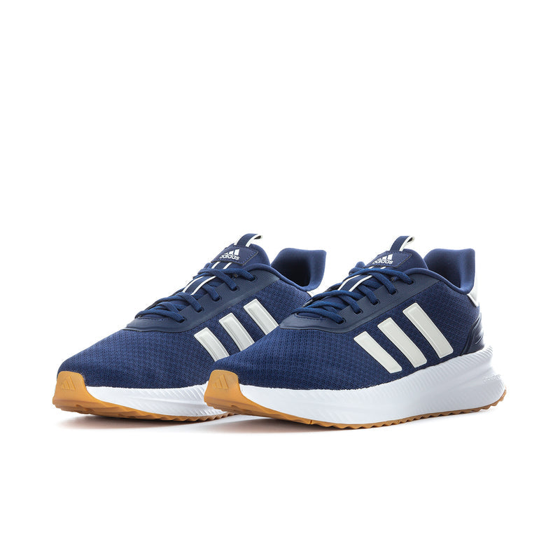Men's navy sneakers pair, white adidas-style stripes, white midsole, gum outsole