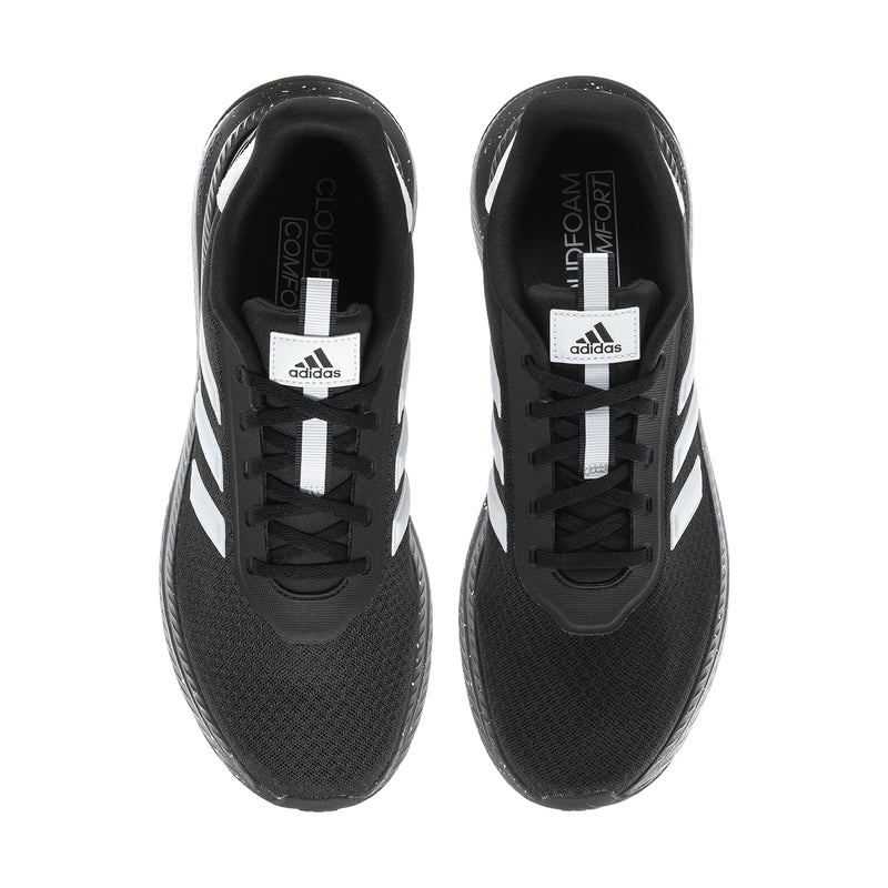 Pair of men's black lace-up shoes with adidas tongue labels and white stripes
