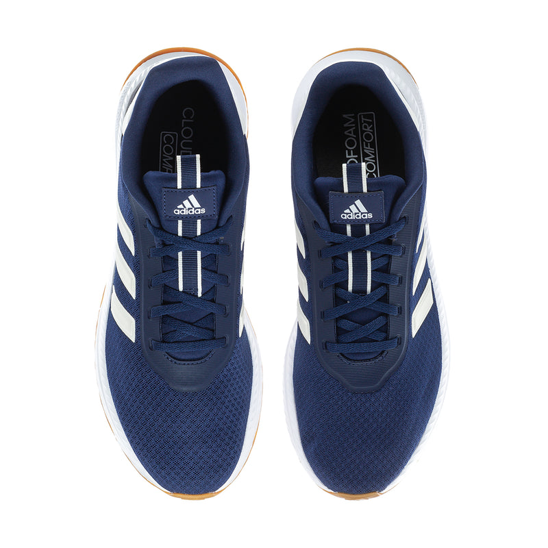 Men's navy sneakers front view with white stripes and lace-up closure, inside tag visible