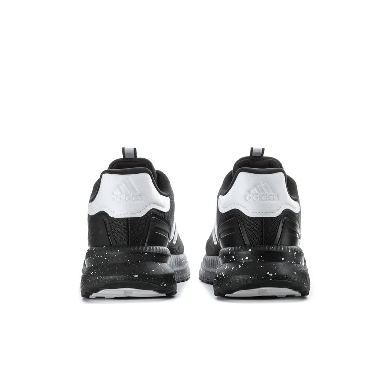Men's black sneakers with white heel panel, rear view, cushioned collar