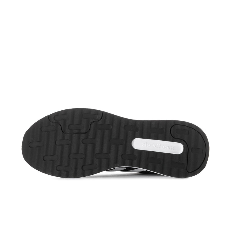 Men's black rubber outsole with raised tread and white midsole trim on adidas sneakers