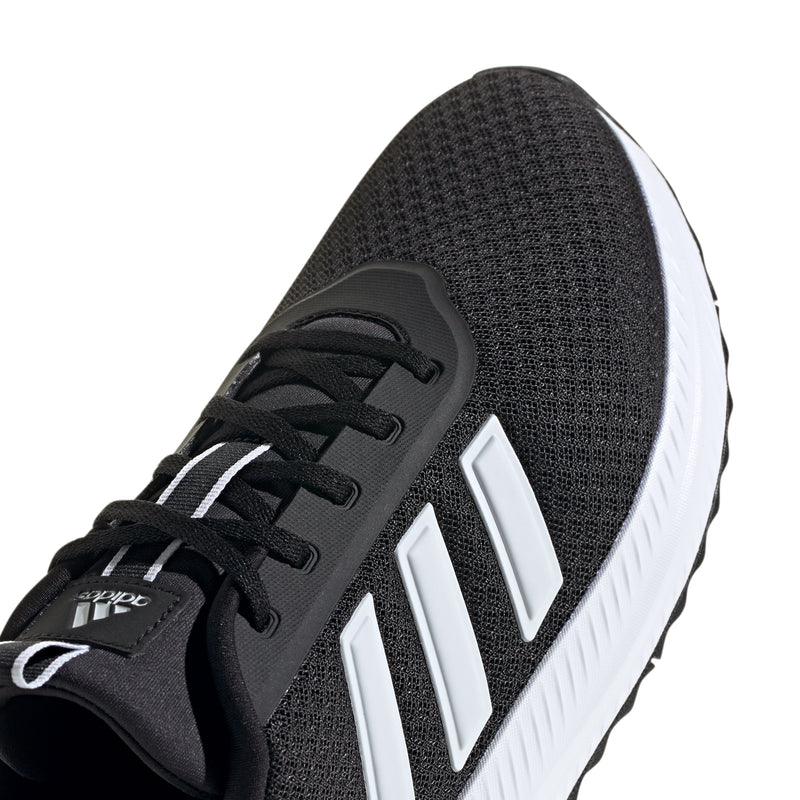 Close-up of men's black mesh upper with white side stripes and black lace-up tongue