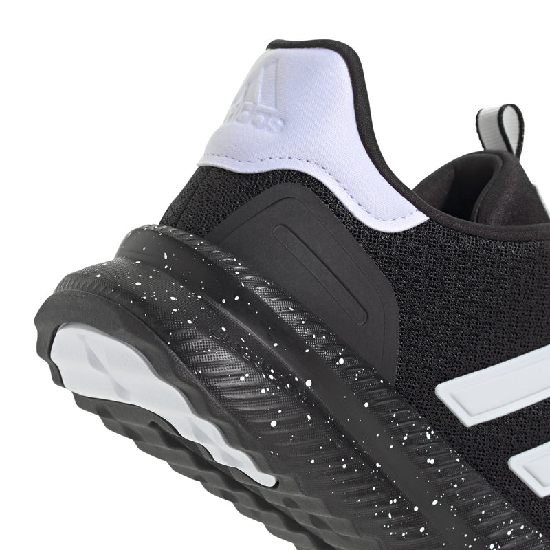 Men's black sneaker with white trim and speckled cushioning midsole detail