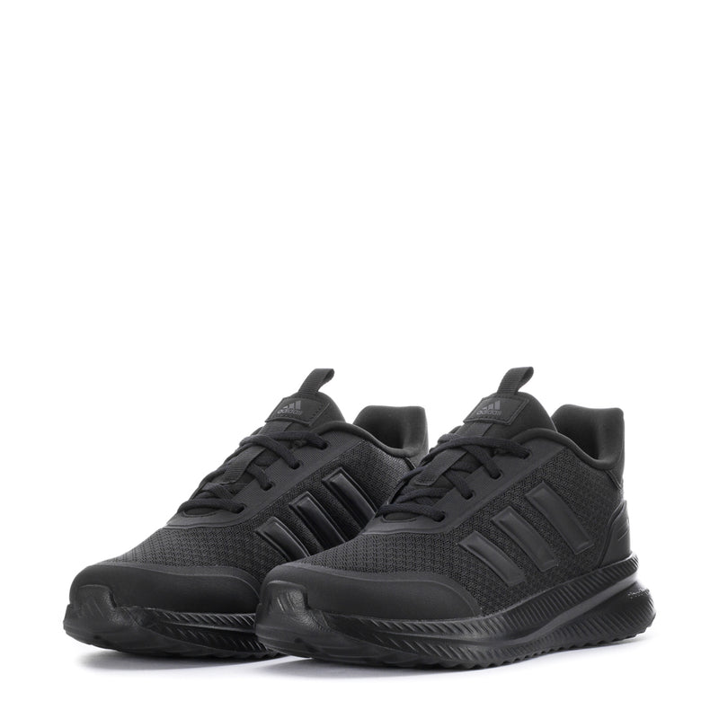 Youth black lace-up running sneakers, two-quarter view with padded collars