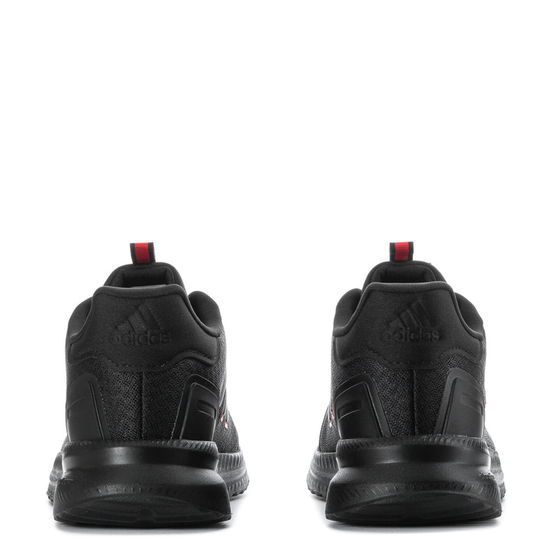 Youth black sneakers rear view with ruby red heel tab and cushioned sole
