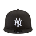 Black baseball cap with white NY Yankees logo on the front