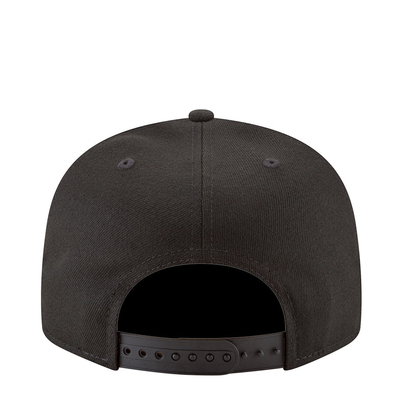 Black baseball cap back view with ventilation eyelets and adjustable strap