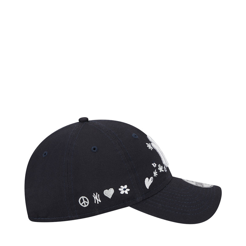 Kids navy baseball cap, side view with peace sign and floral hearts embroidery