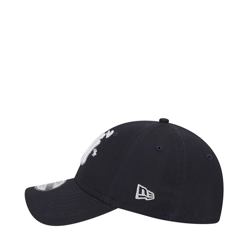 Kids navy baseball cap with small New Era logo and scattered peace/flower accents