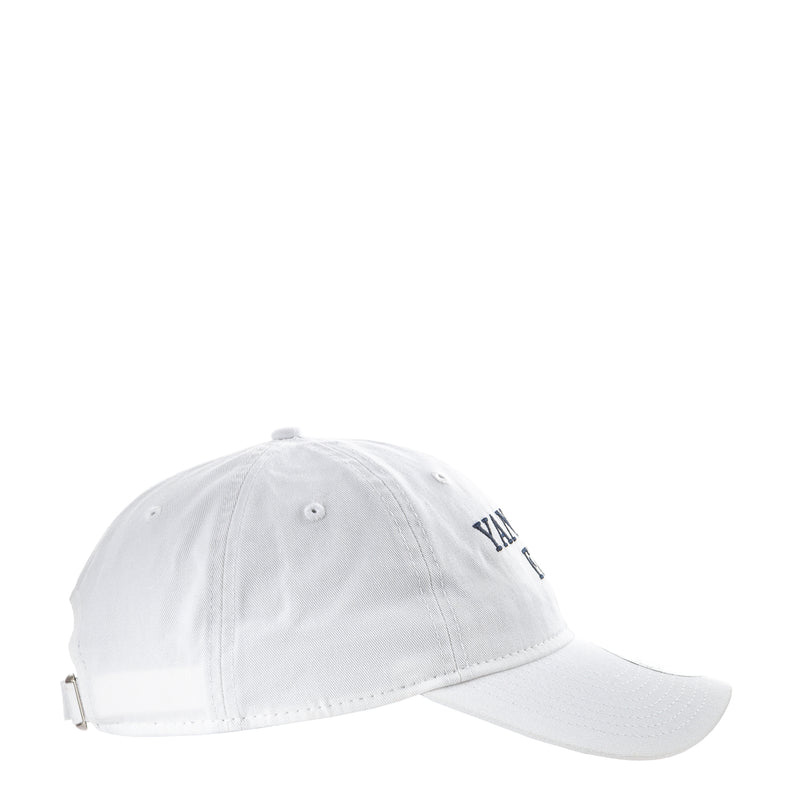 White baseball cap with small Yankees logo on the side