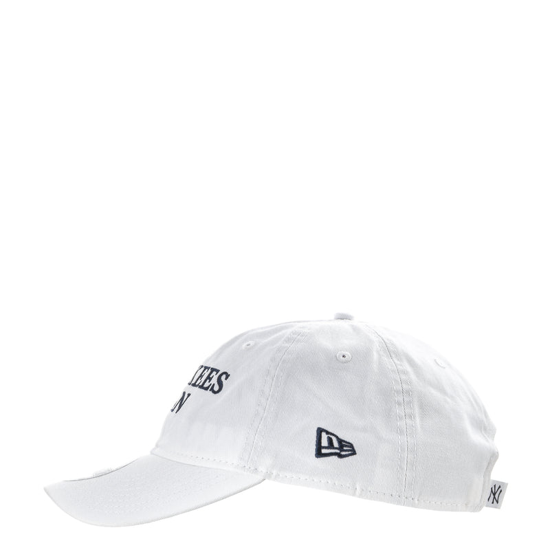 White baseball cap with Yankees side text, New Era flag, and NY emblem