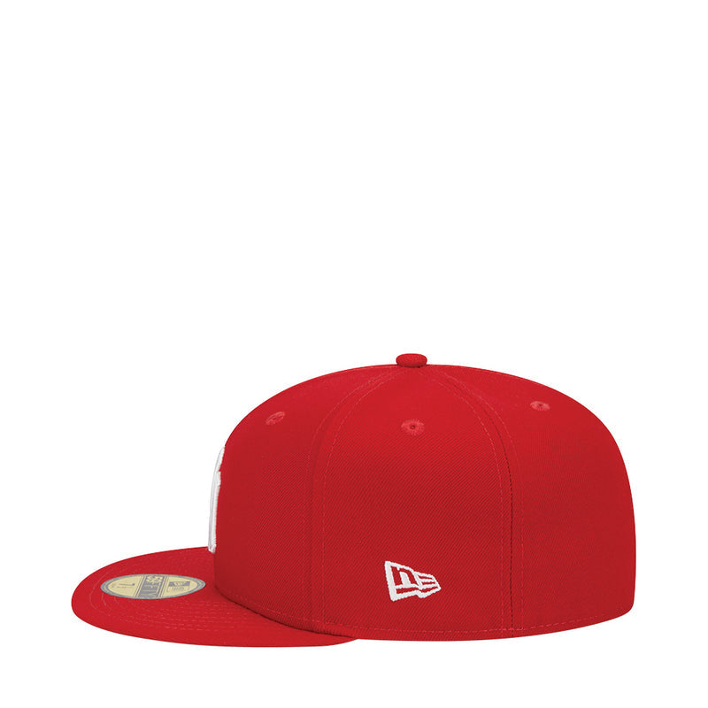 Red baseball cap with white New Era logo on back