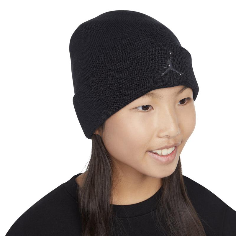 Youth cuffed beanie, black knit, silver Jumpman logo, worn by child