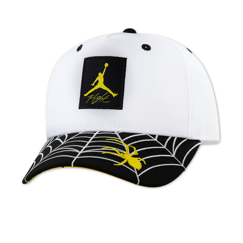 Youth snapback cap in white with black front Jumpman logo patch and yellow accents