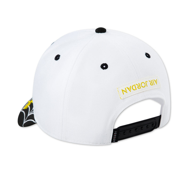 White snapback cap with black adjustable back strap and small yellow logo label