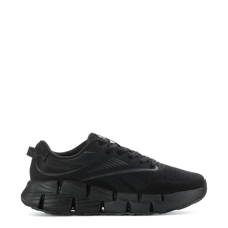 Black youth lace-up running shoes with textured knit upper and chunky trail sole