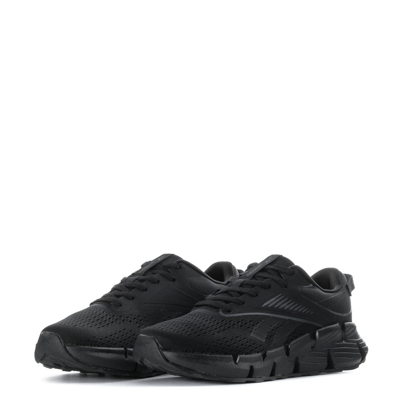 Black youth lace-up running shoes, angled view showing breathable mesh upper