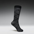 Black patterned sock on a gray background